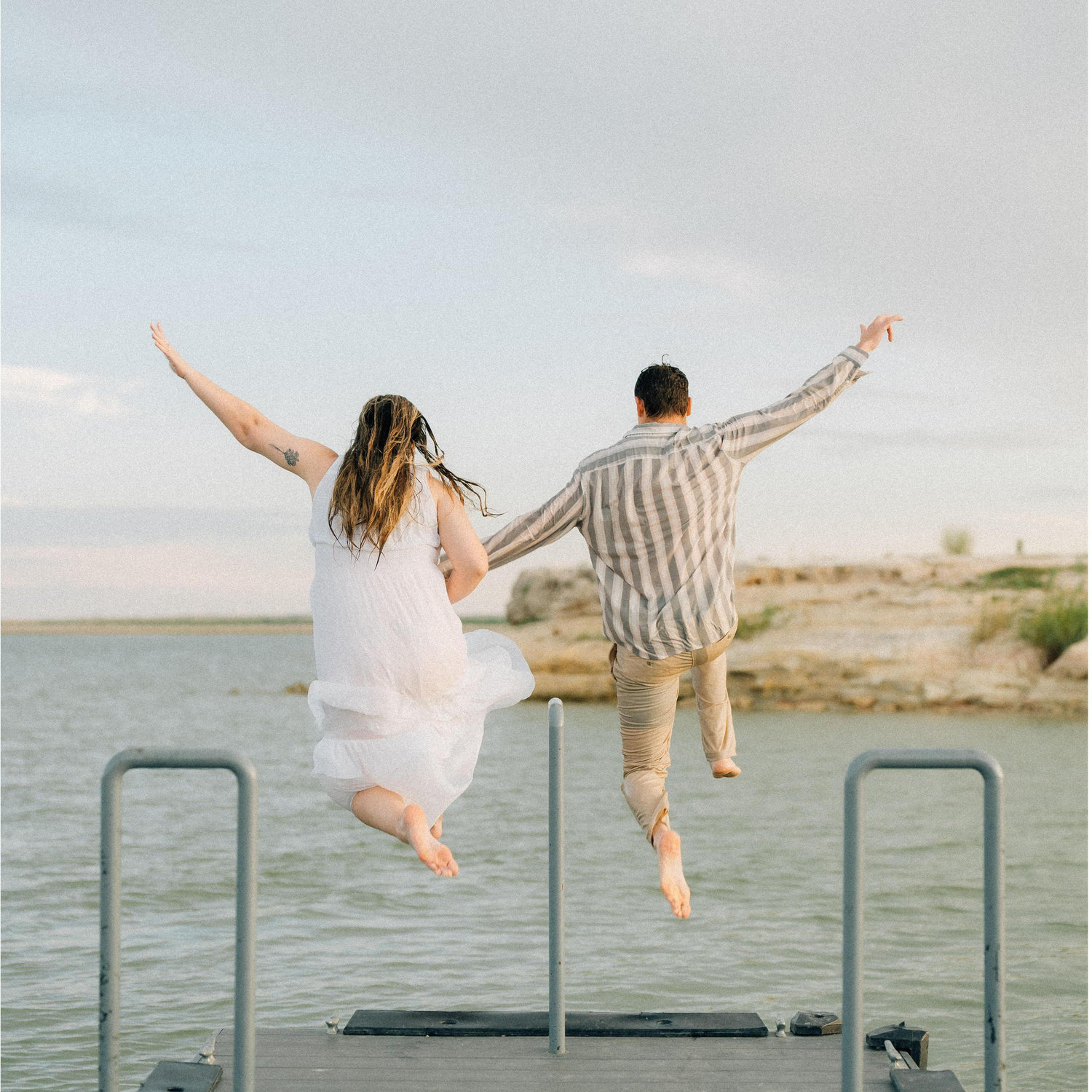 When our photographer has a vision, we said let's do it! Taking the literal plunge together was such an easy decision!