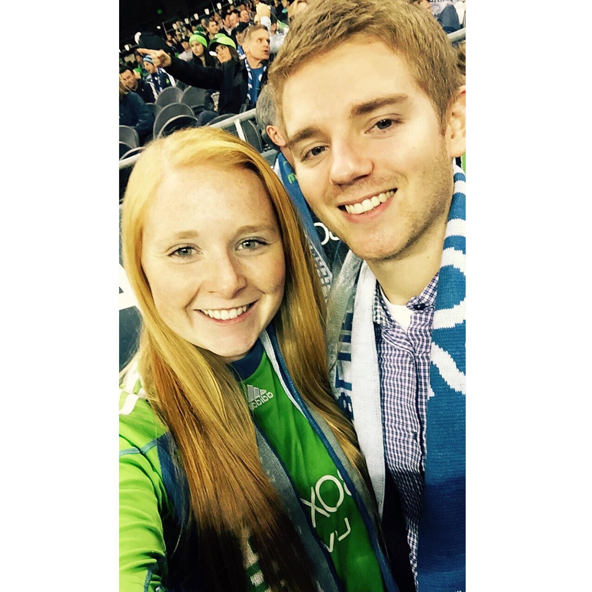 At a Sounders FC soccer game which we attended often while living in Seattle.