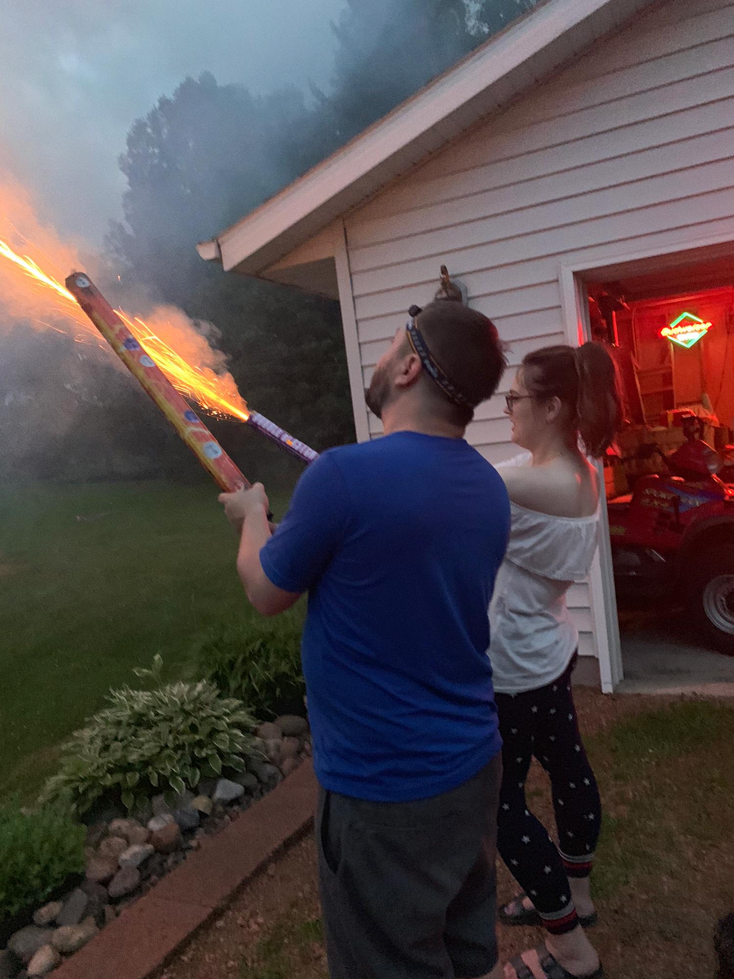 4th of July and Alyssa's 1st time holding a firework!