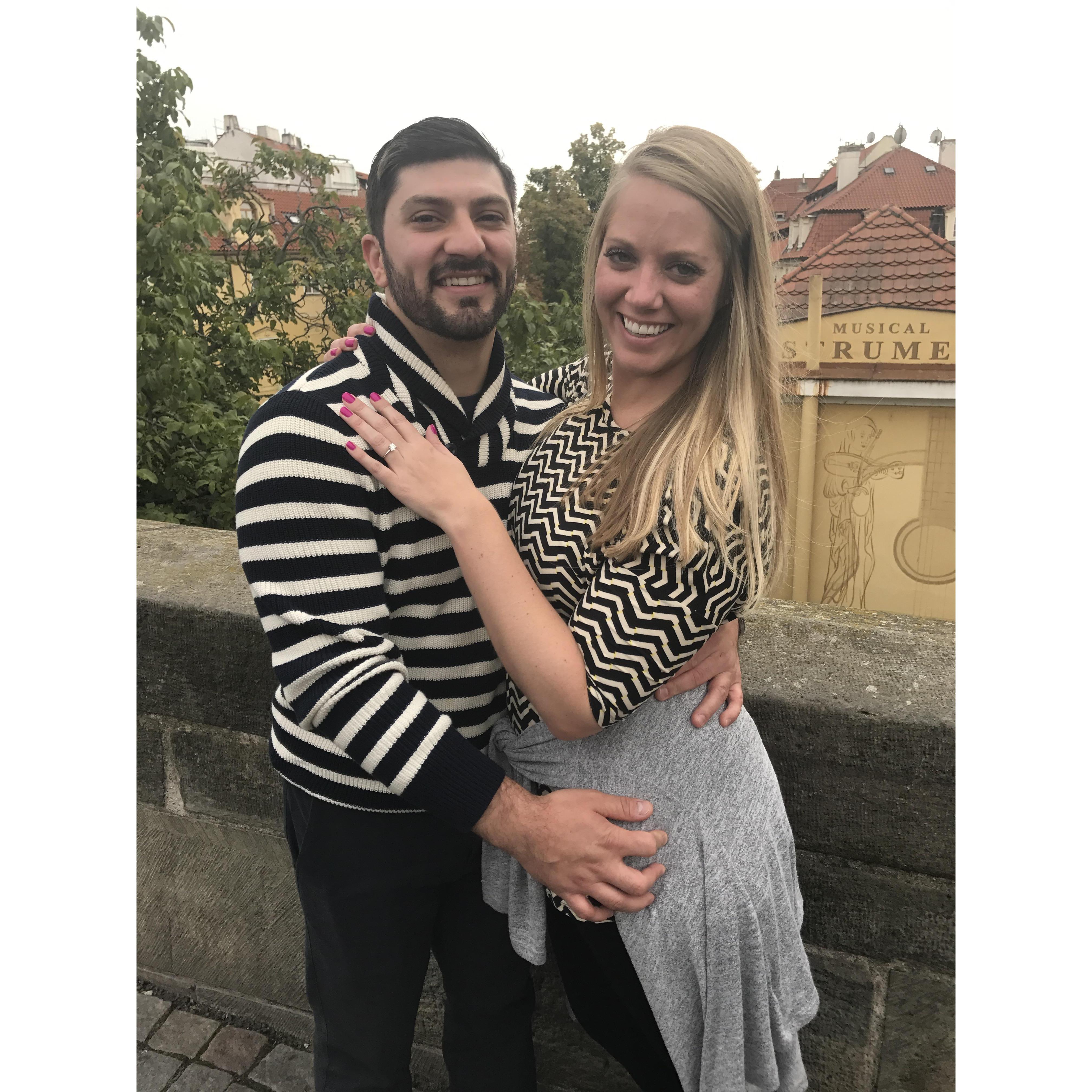 On the St. Charles Bridge in Prague shortly after getting engaged