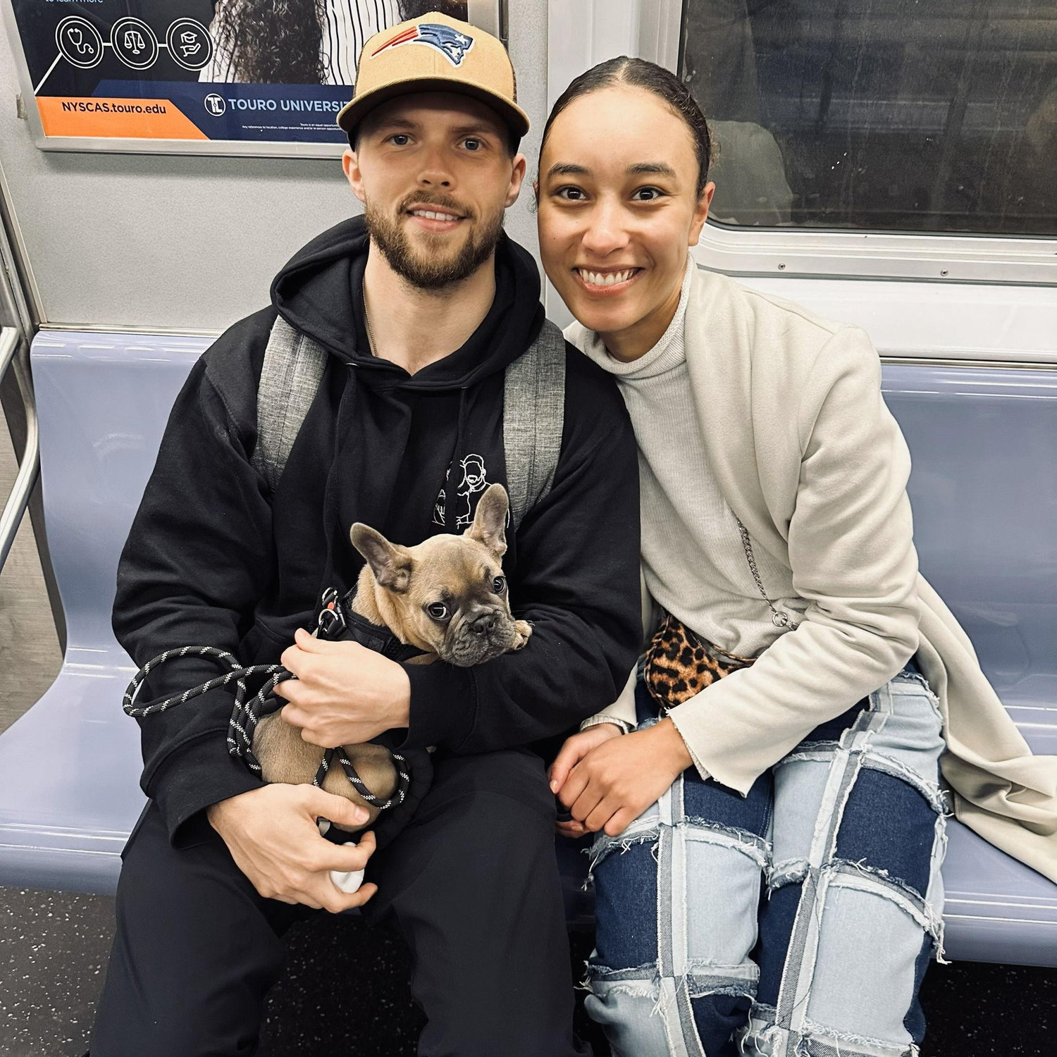 Zuko's first trip on the subway and someone offered to take this picture of us
