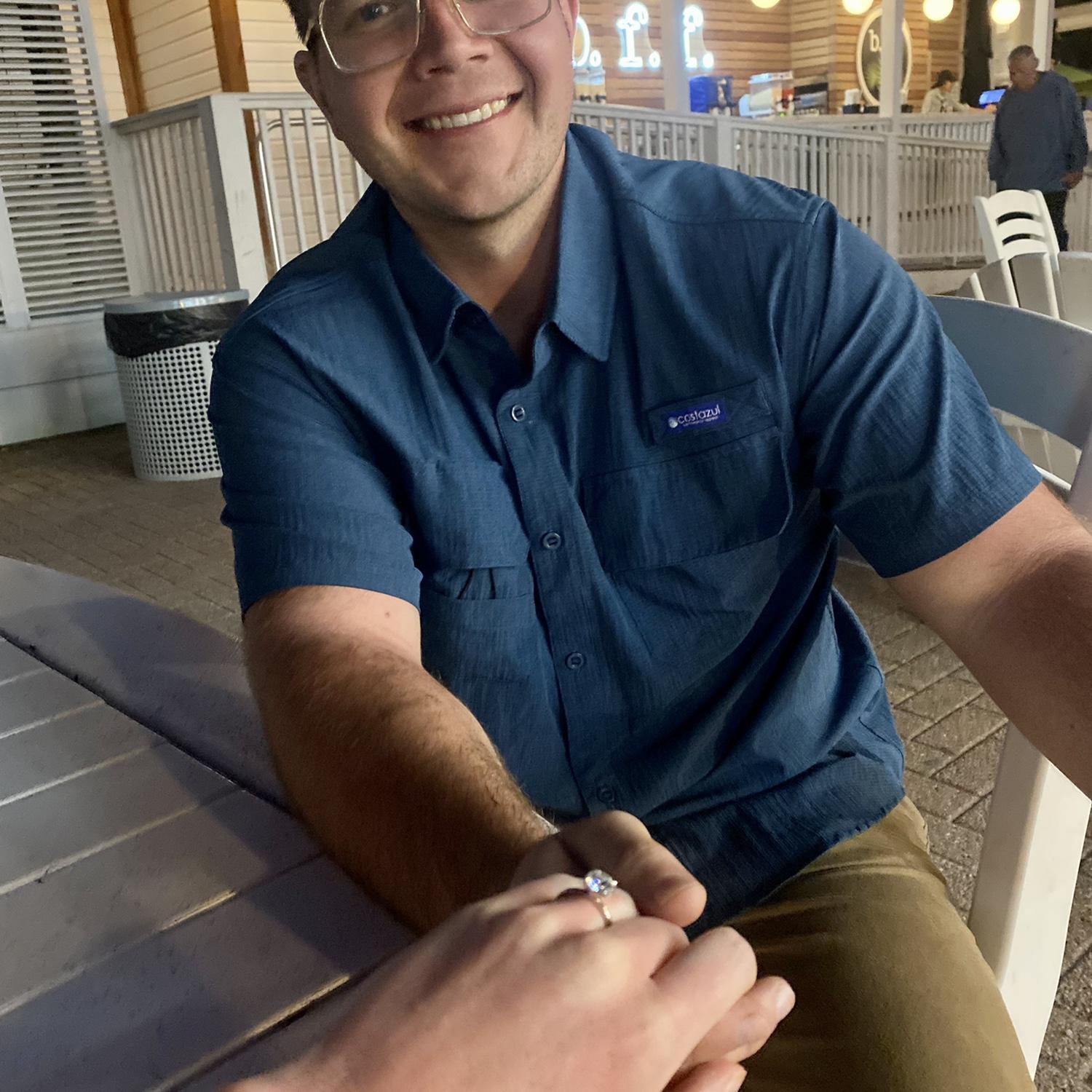 Engaged!!! the boardwalk at Seaside where we happily enjoyed ice cream before dinner a few moments after we got engaged.