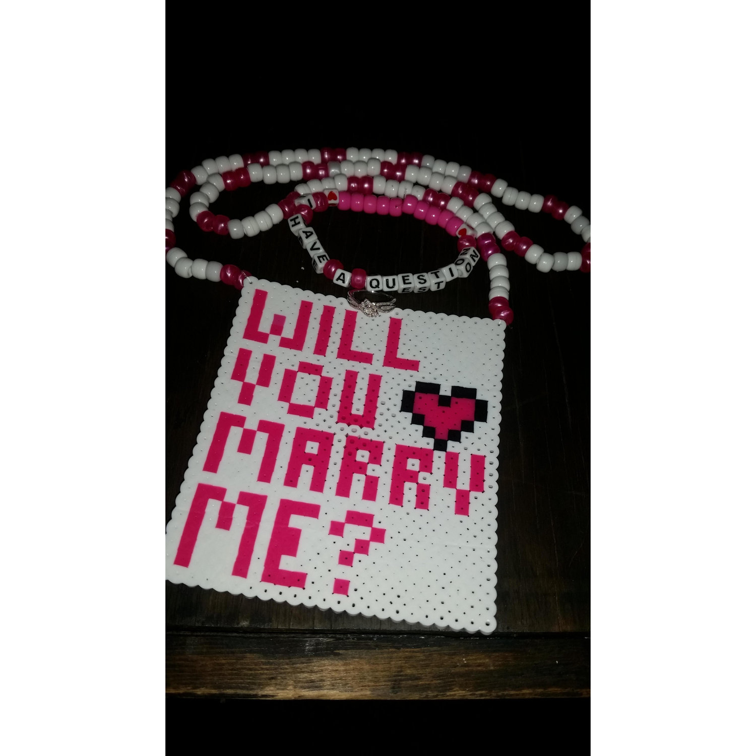 The "kandi" he had made, & the ring he proposed with.