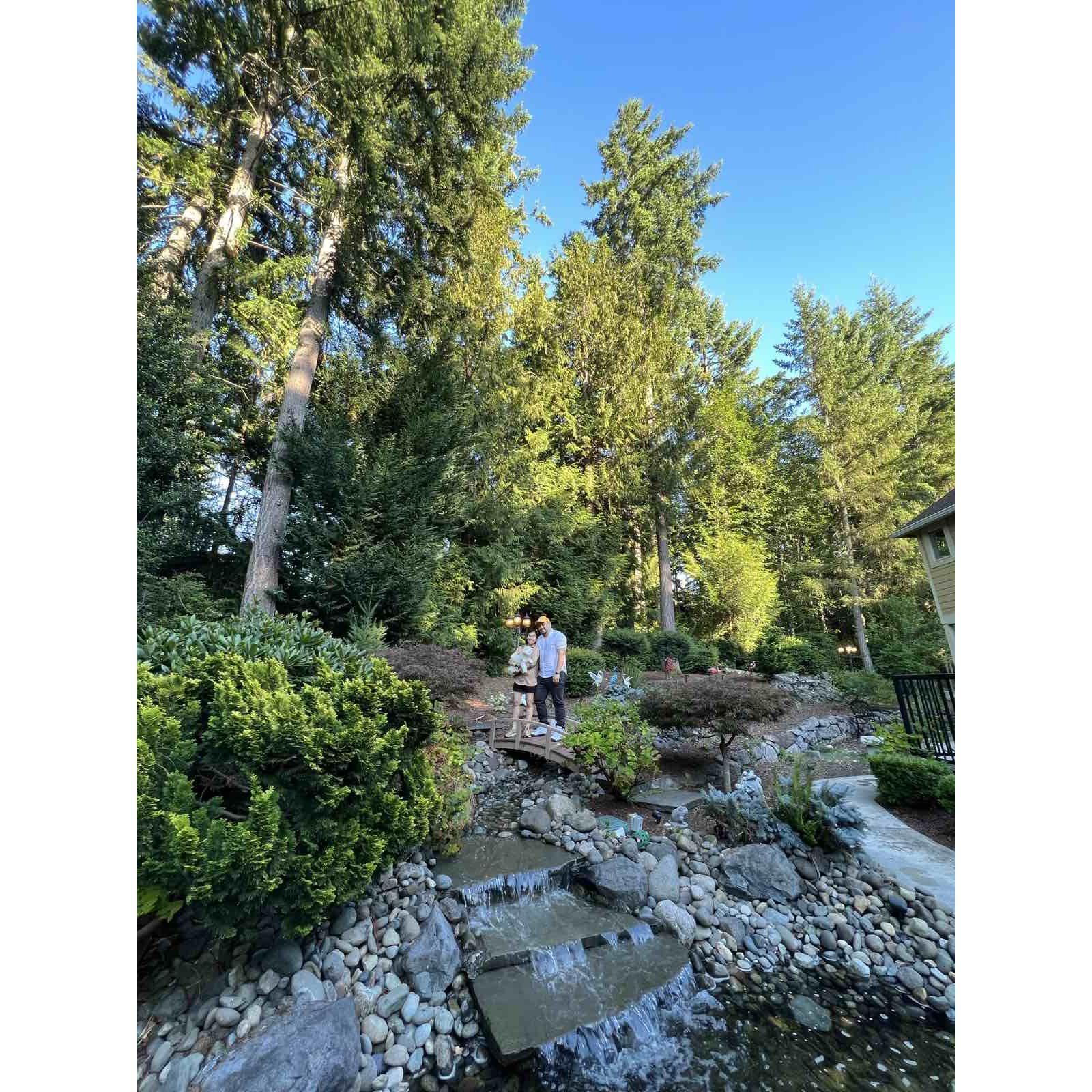 Posing with Johnson in the backyard in front of a lovely water feature!