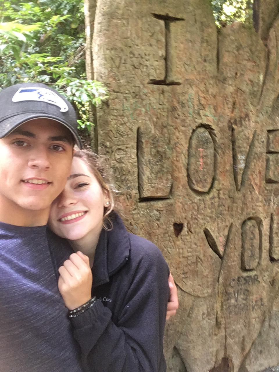 Coast trip with Ian's family, he carved our initials into the tree shaped like a heart