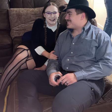 Halloween party as Doc Holiday and Wednesday Addams, 2021