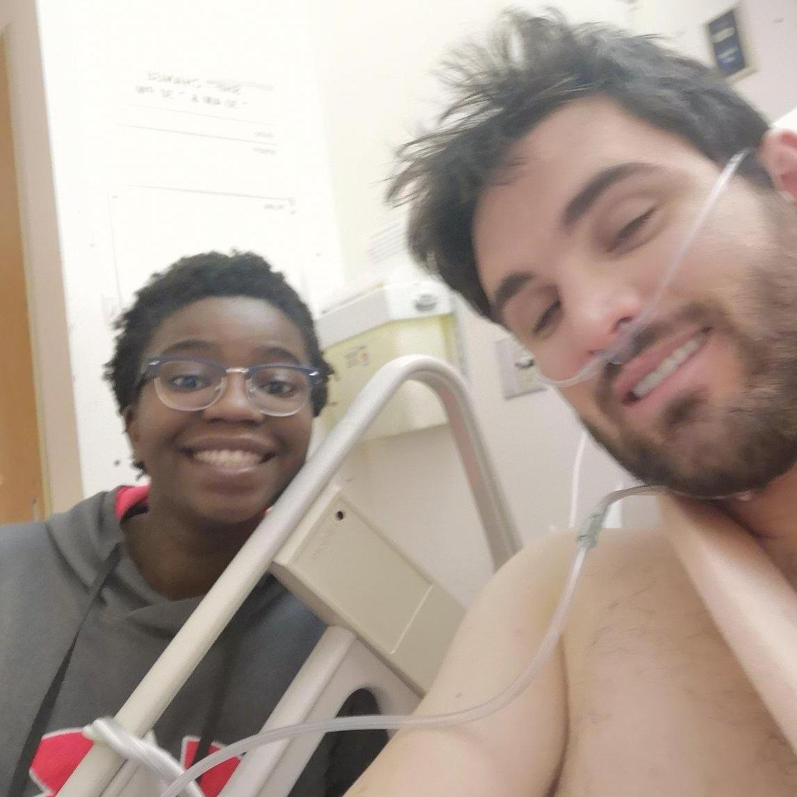 Photo right after Rob's arm surgery. Rob insisted on getting a photo together.