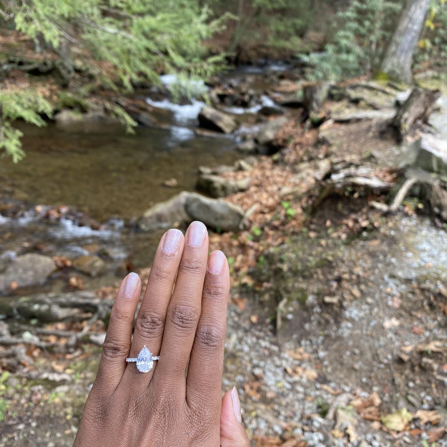 Proposed at a waterfall during our anniversary trip.