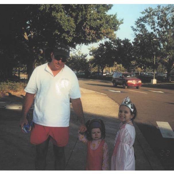 Alexis with her Uncle Ty and cousin, KC, on Halloween (2000)