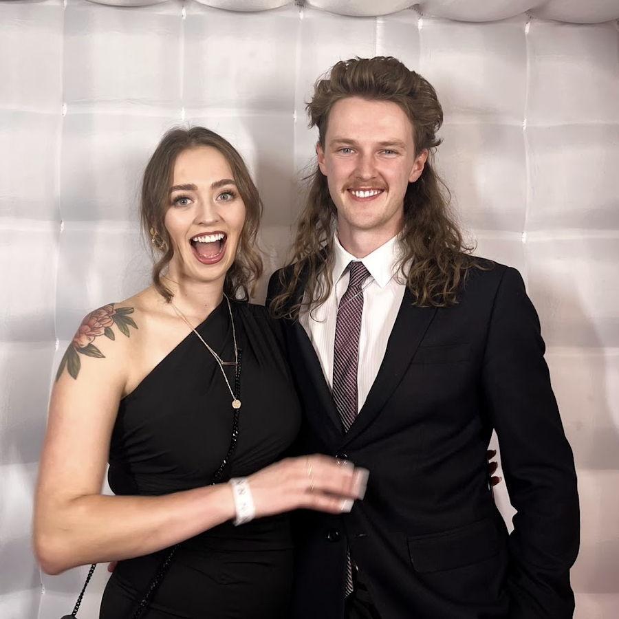 Attending a formal dance event at Adams House, 2022