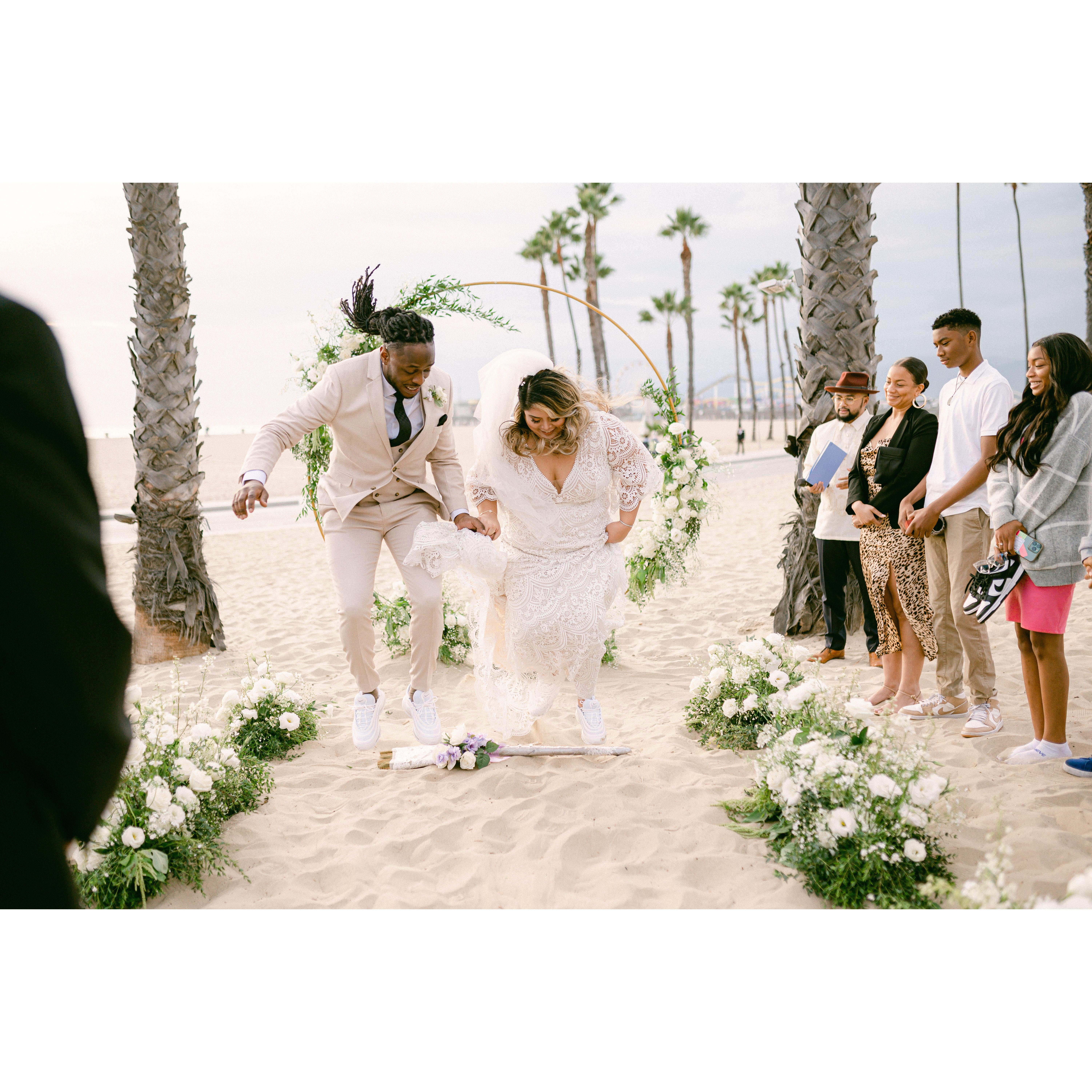 Jumping the broom is a time-honored African American wedding tradition. The act symbolizes a new beginning, sweeping away of the past, & signifies the joining of two families.