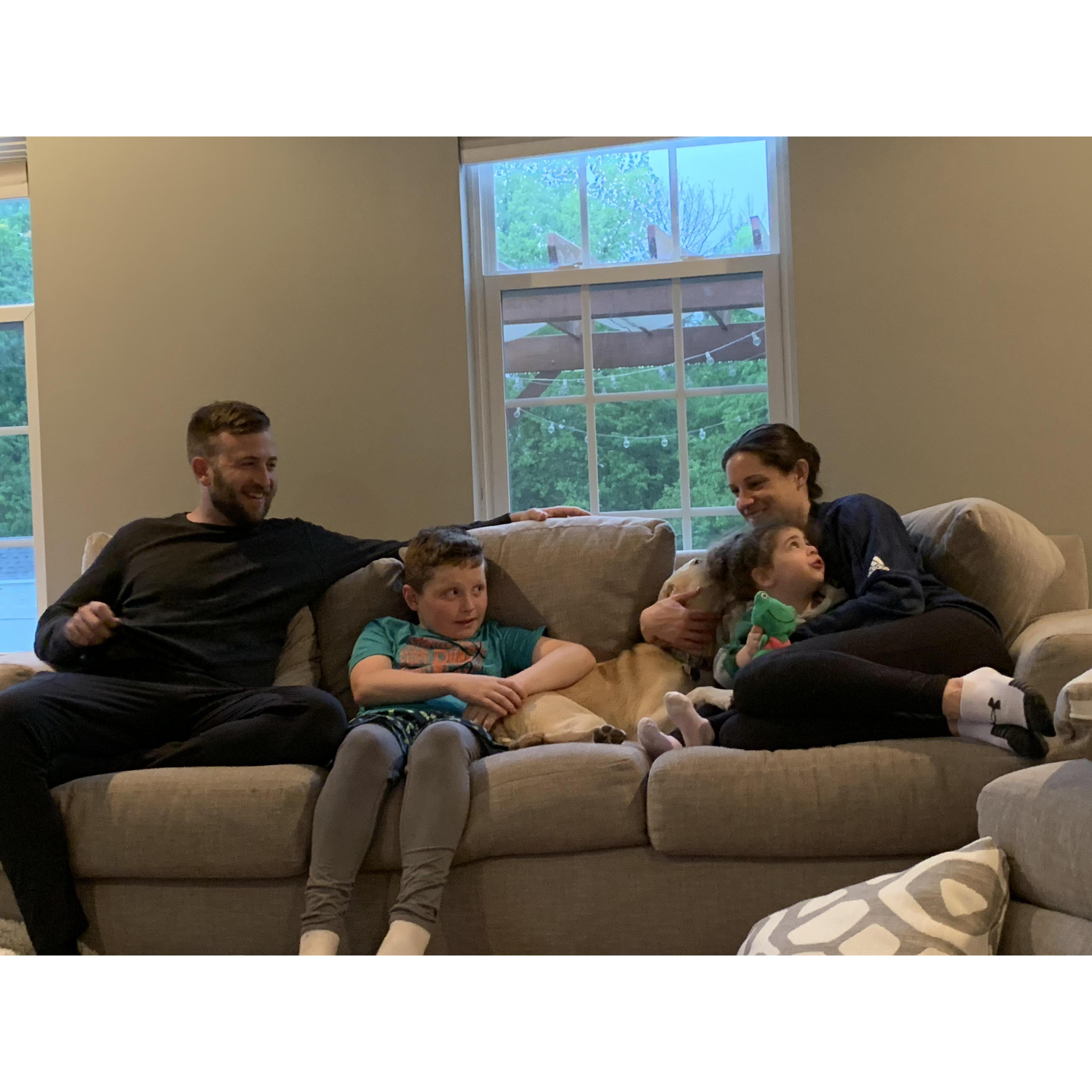 Steph and Zak hanging out with niece Charlie and nephew Carter, complete with cuddles from puppy Penny!