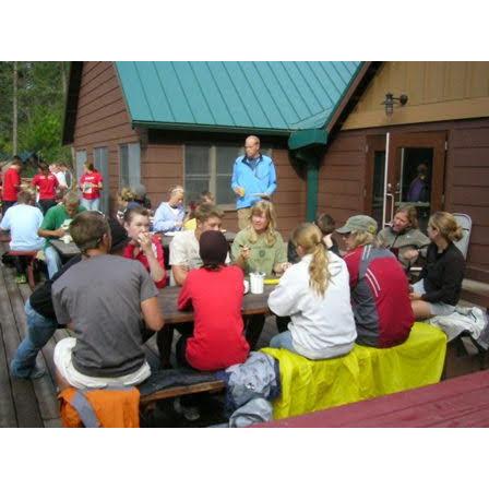 Flathead Lutheran Bible Camp. Zac and Tori were there at the same time when they both were in middle school. Tori can be seen in the bright red shirt in front and Zac is in the background in the green