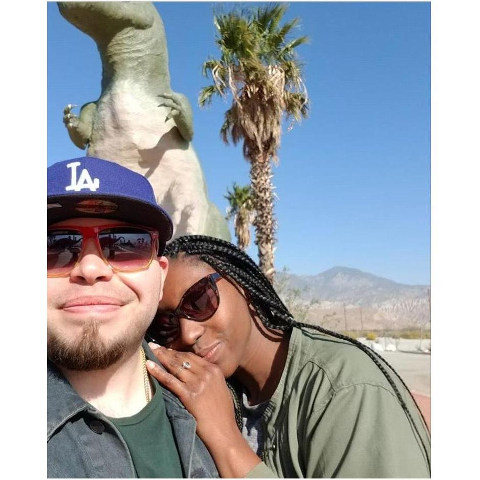 Moments after a monumental proposal in the shadow of a T-Rex.