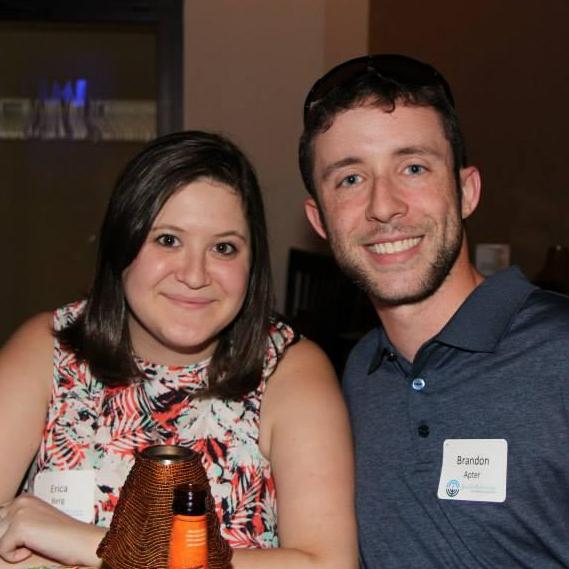 Cheesin' it up at a comedy show just three months after meeting