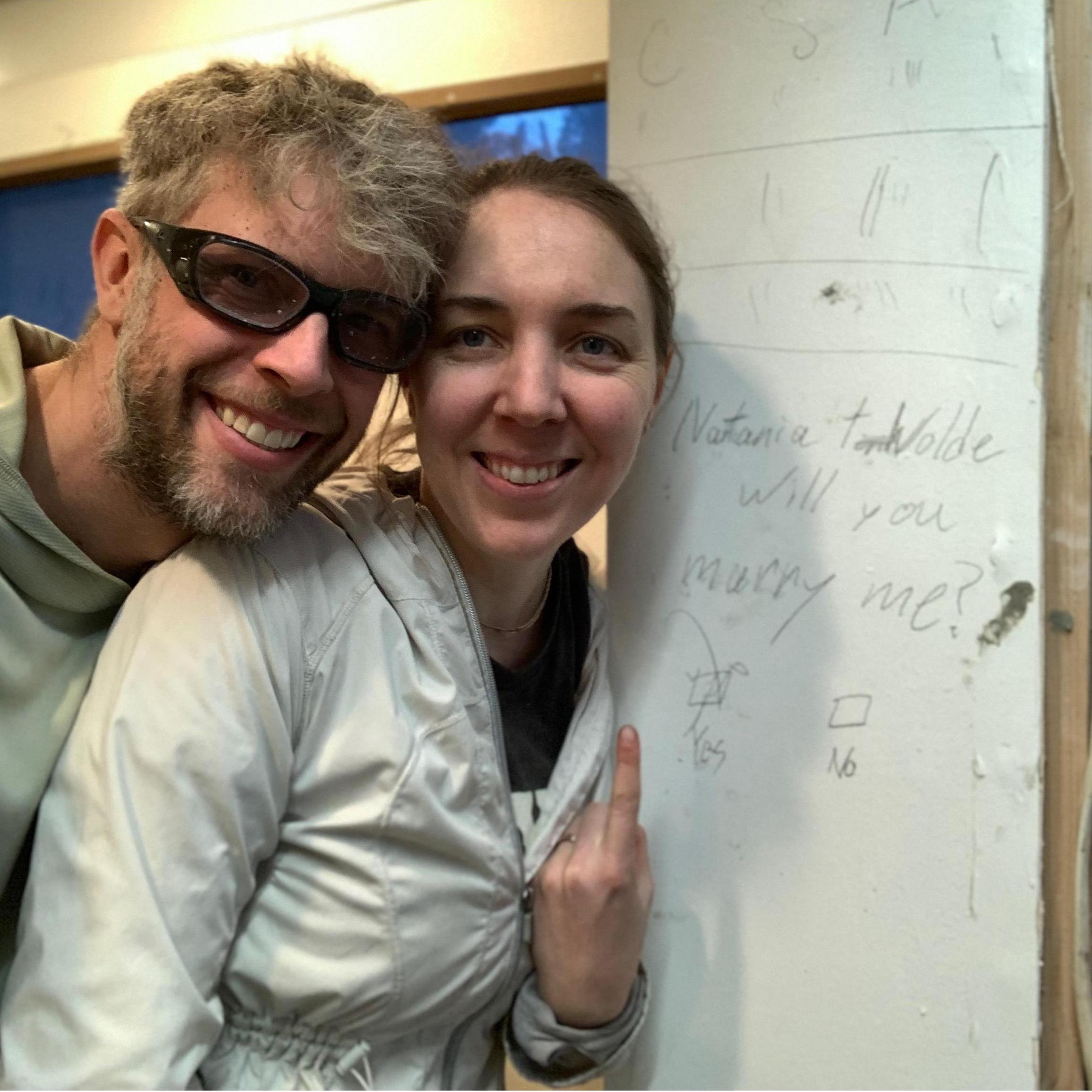 Tired, really dirty, but victorious on completing two major life events: first concrete floor and getting engaged.