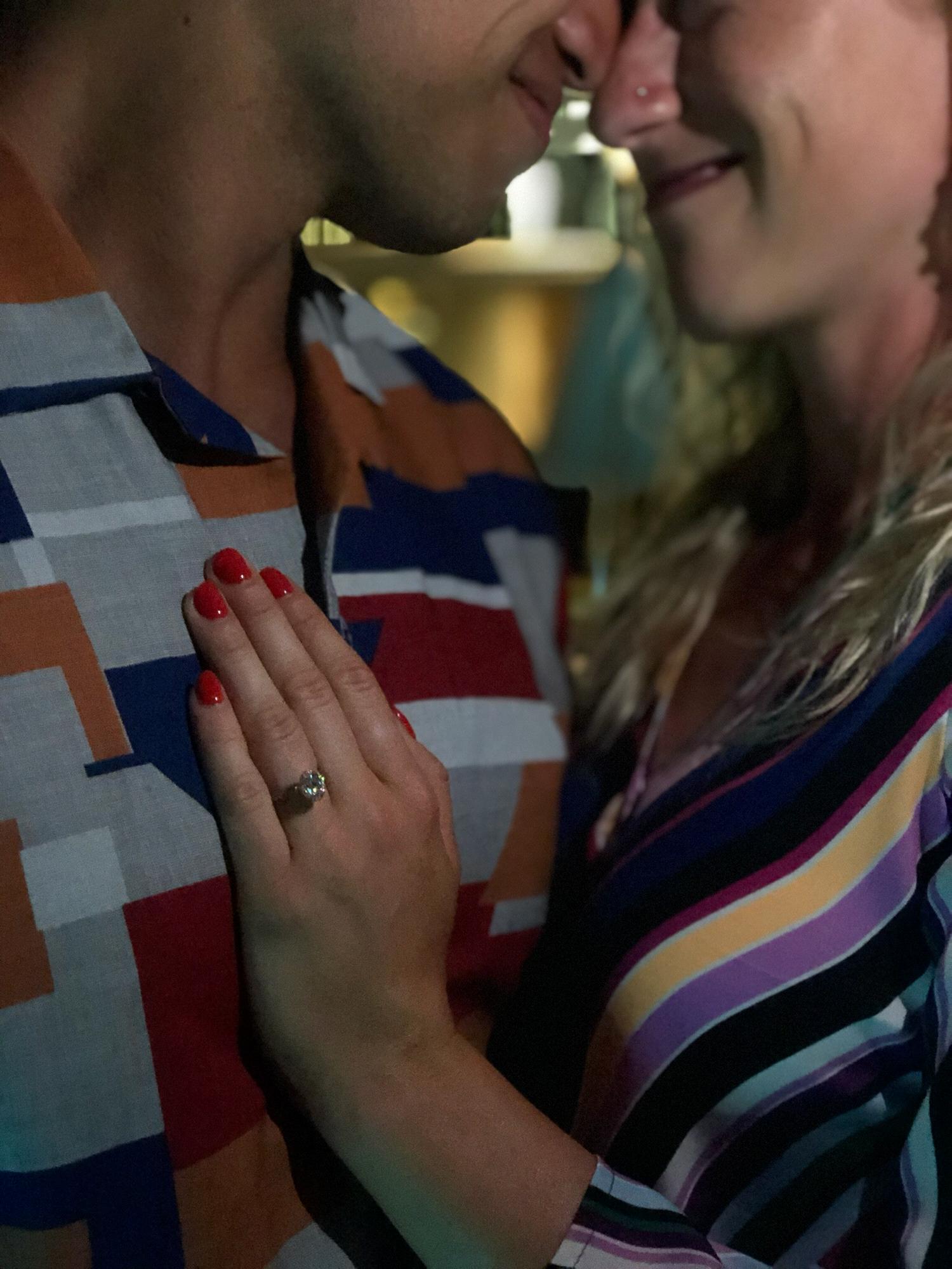 We asked someone to take our picture right after the engagement and that person happened to be a professional photographer! These pictures were awesome!