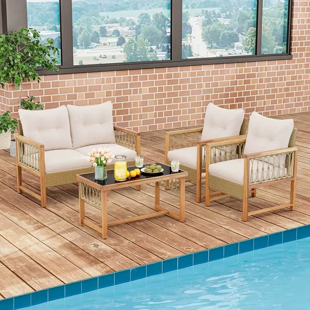 Costway 4 PCS Patio Furniture Set with Acacia Wood Frame Cushions and Coffee Table