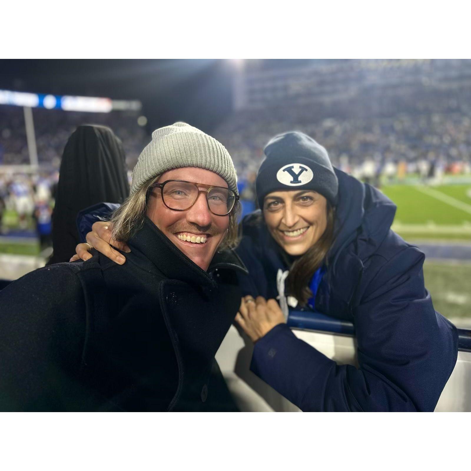 John supporting Whit as she covers a BYU football game.