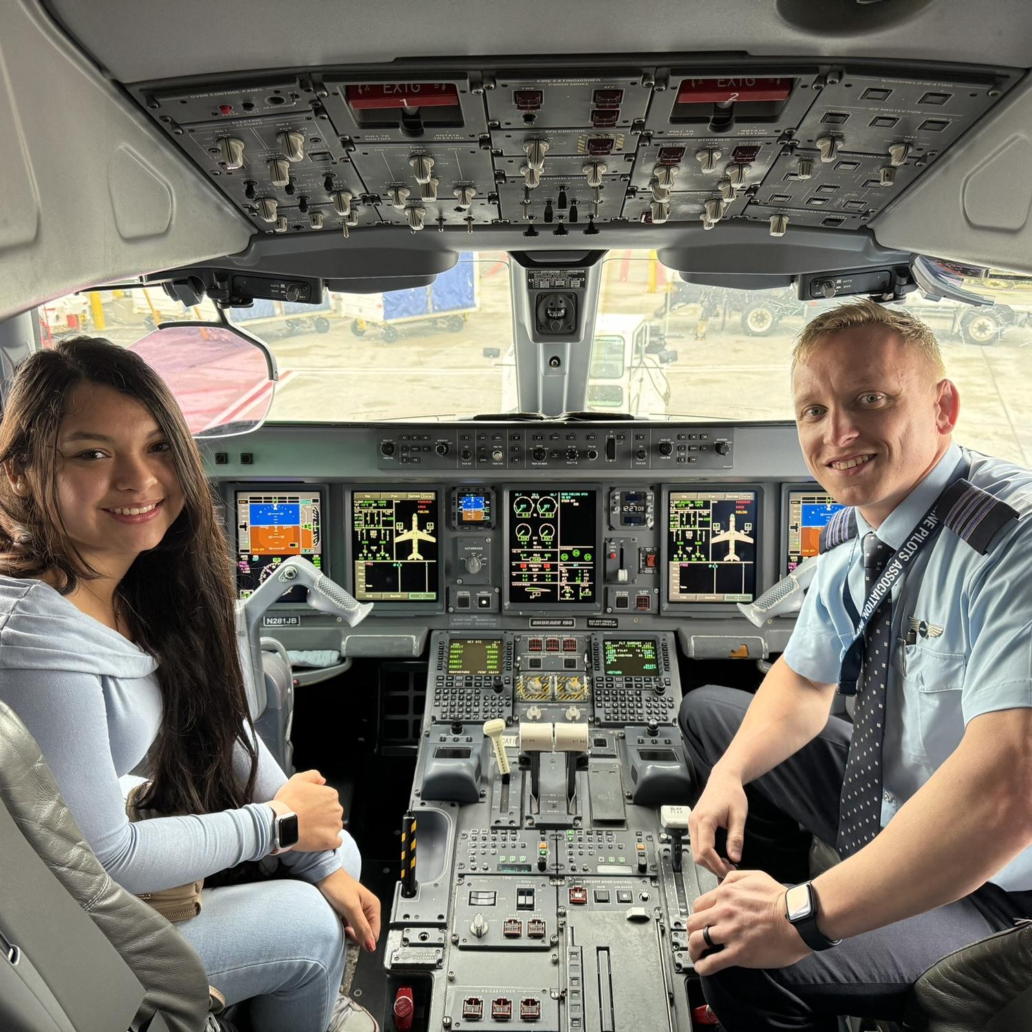 Isa flying for the first time with Emmet while he is working