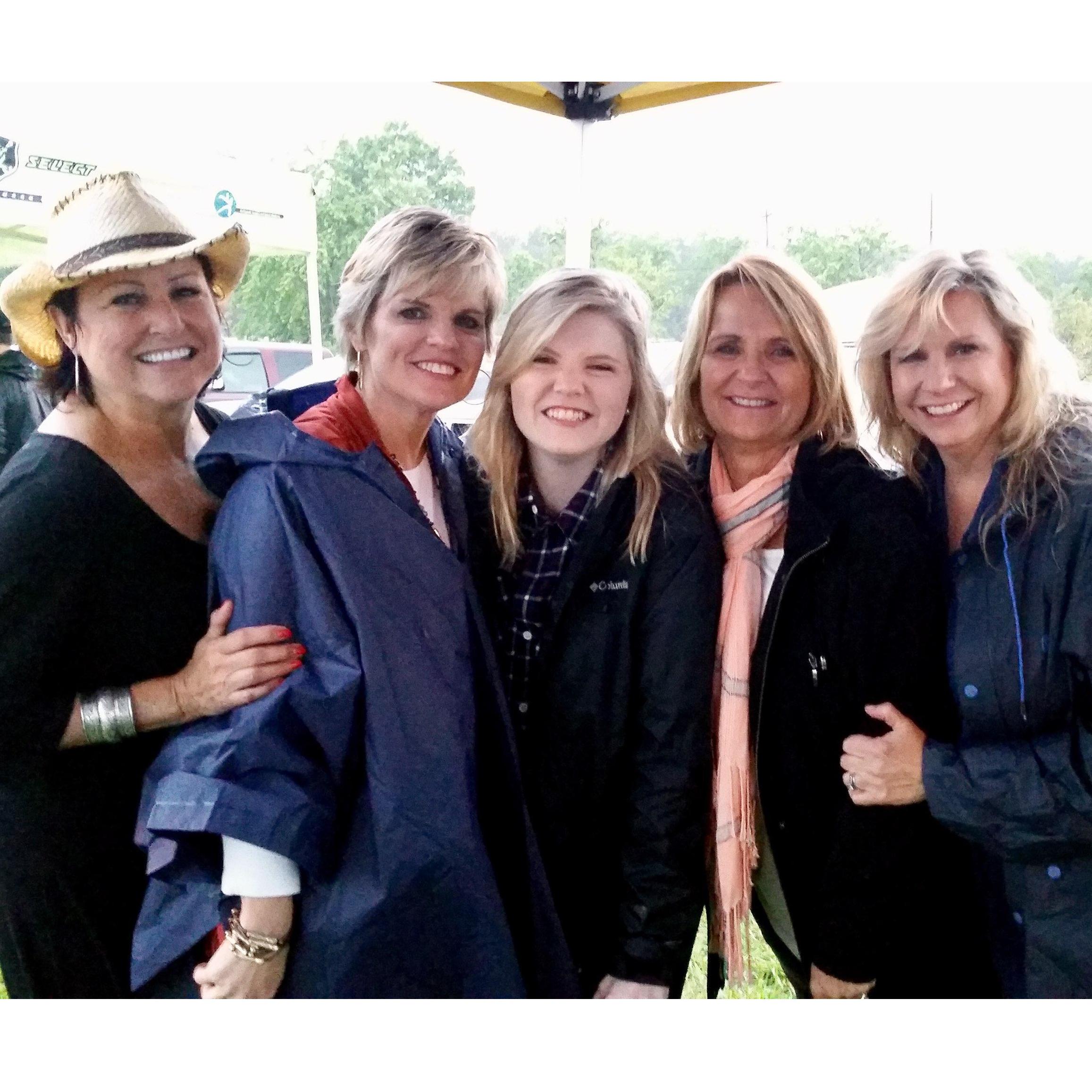 Caroline with her mom and aunts on her 21st birthday