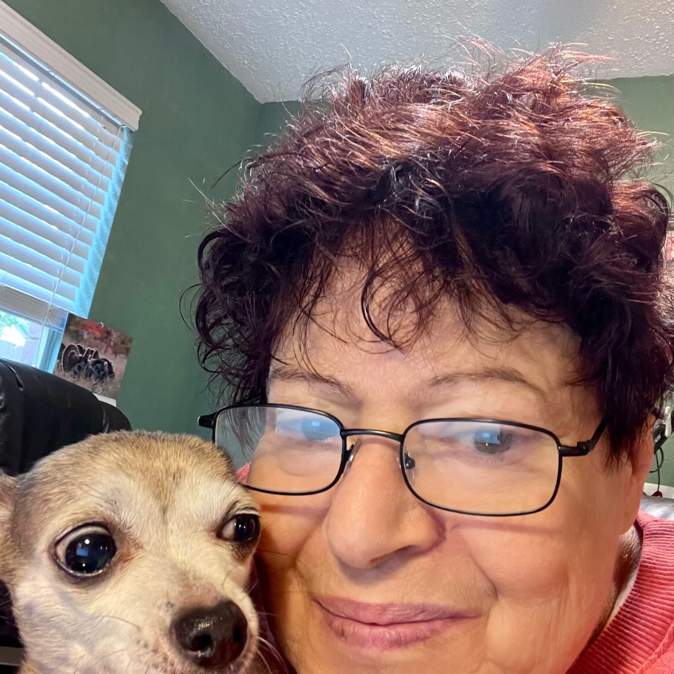 Victoria and Salsa, one of her Chihuahas.