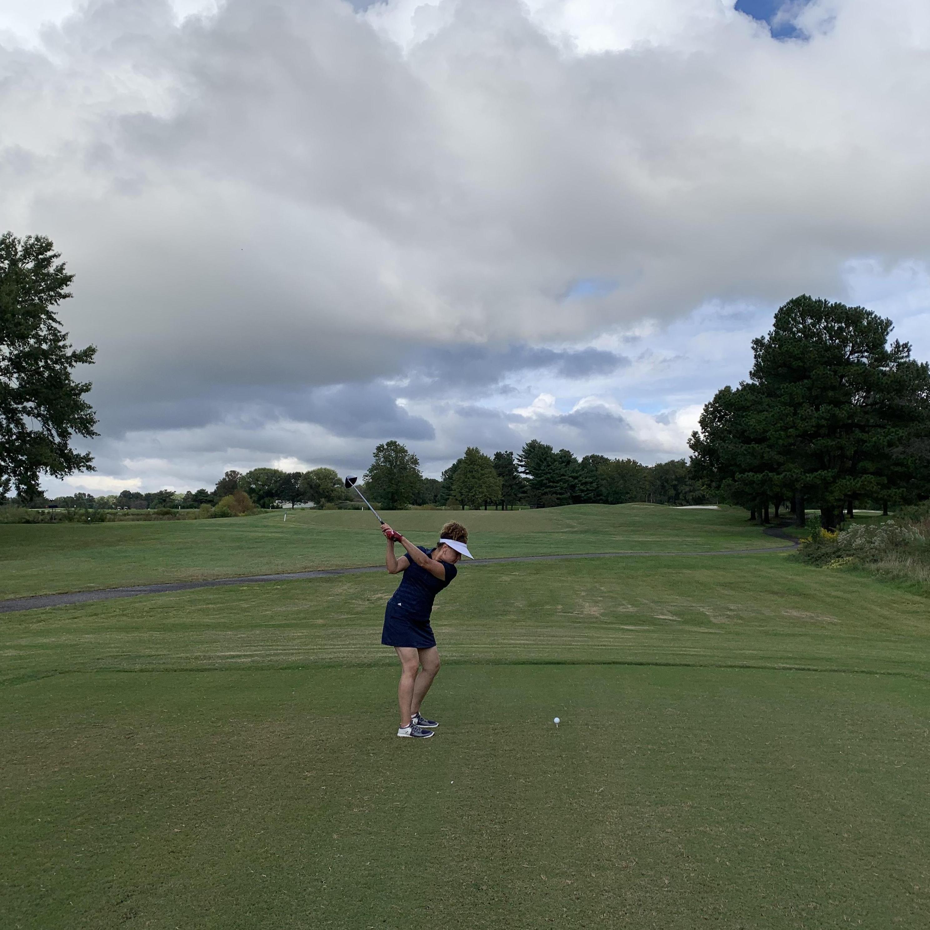 Nice form.  She's a killer from the tee box.  A driving force for sure!