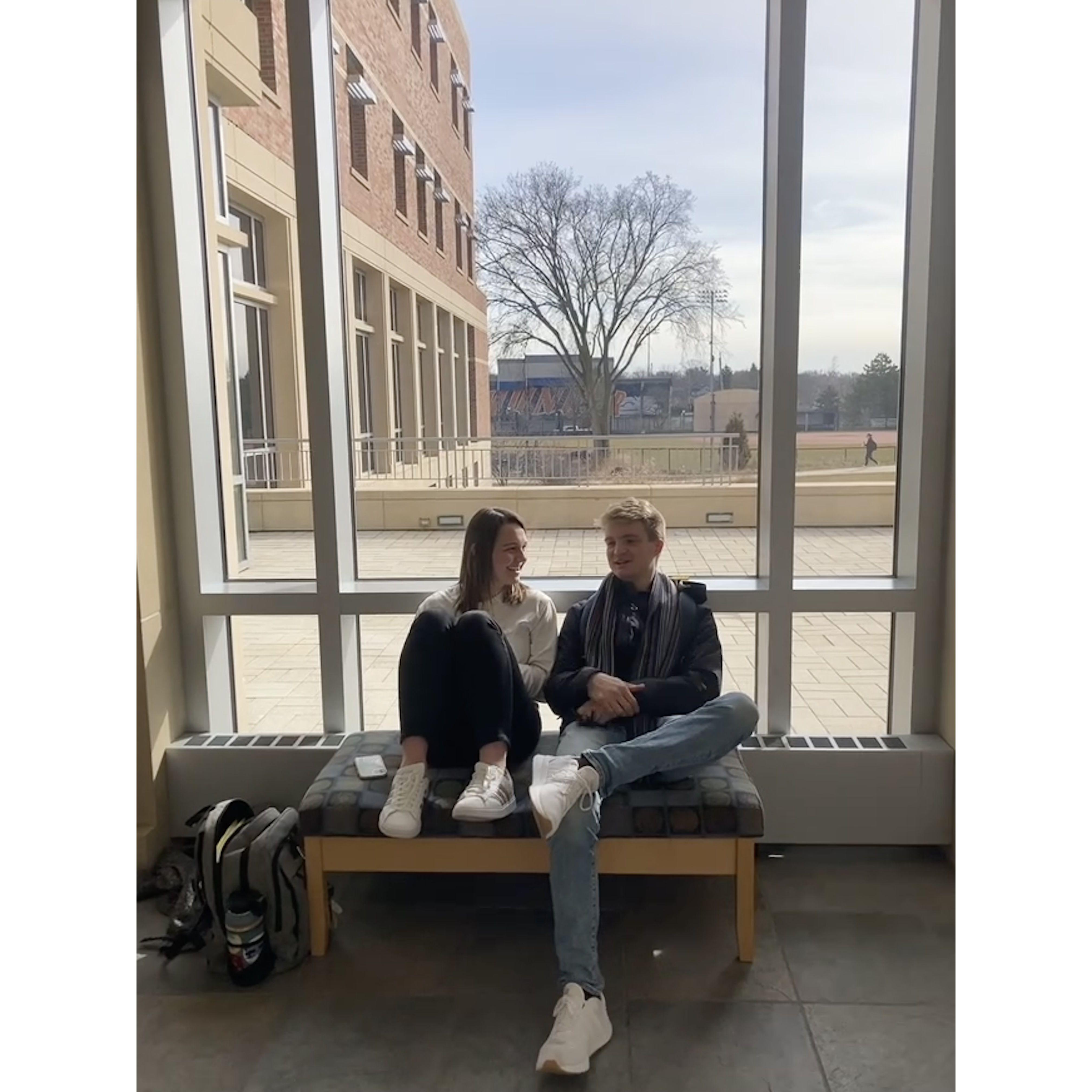 A friend captured this photo of us saying a quick hello in between classes and Samuel explaining some smart chemistry thing