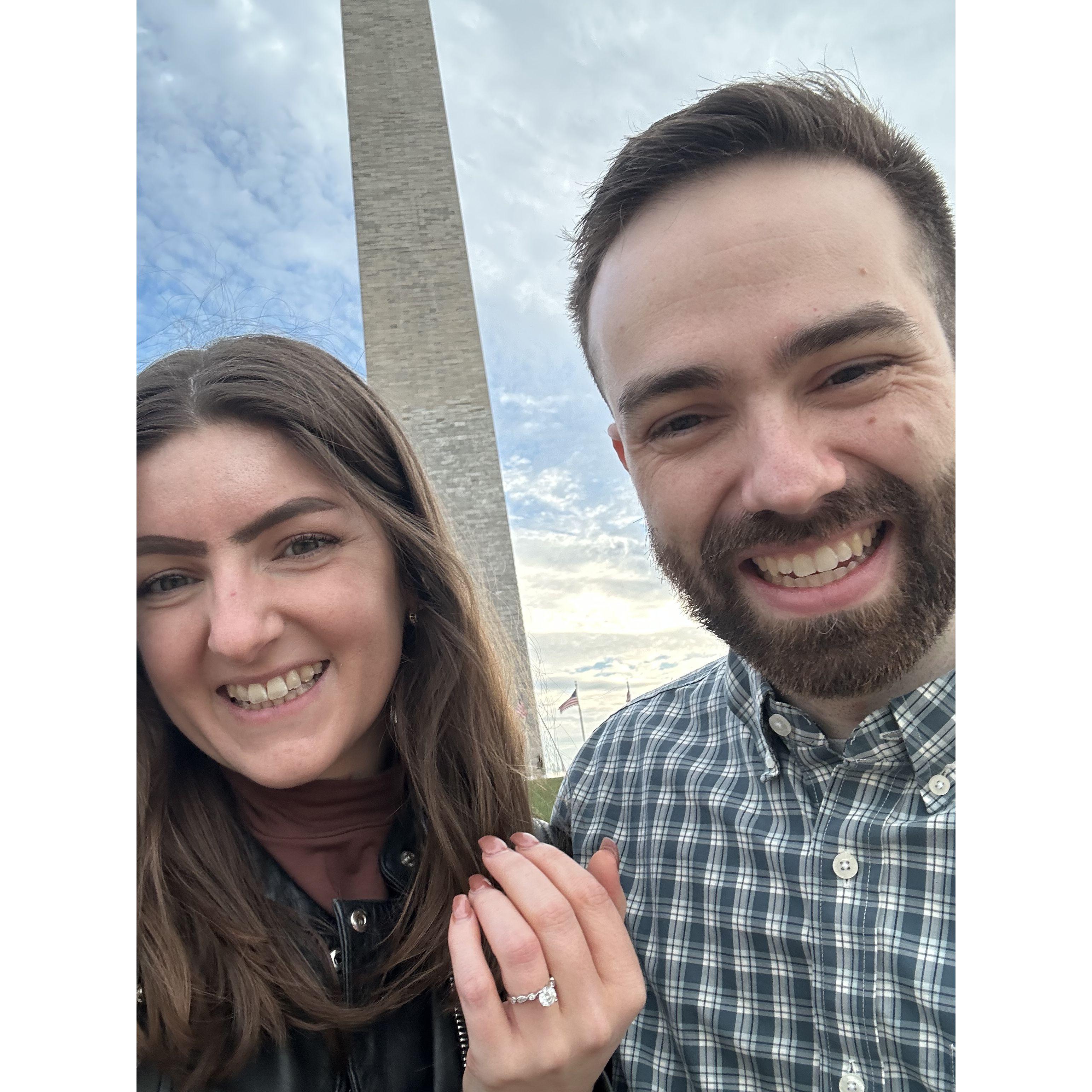 An engagement selfie at the Washington Monument