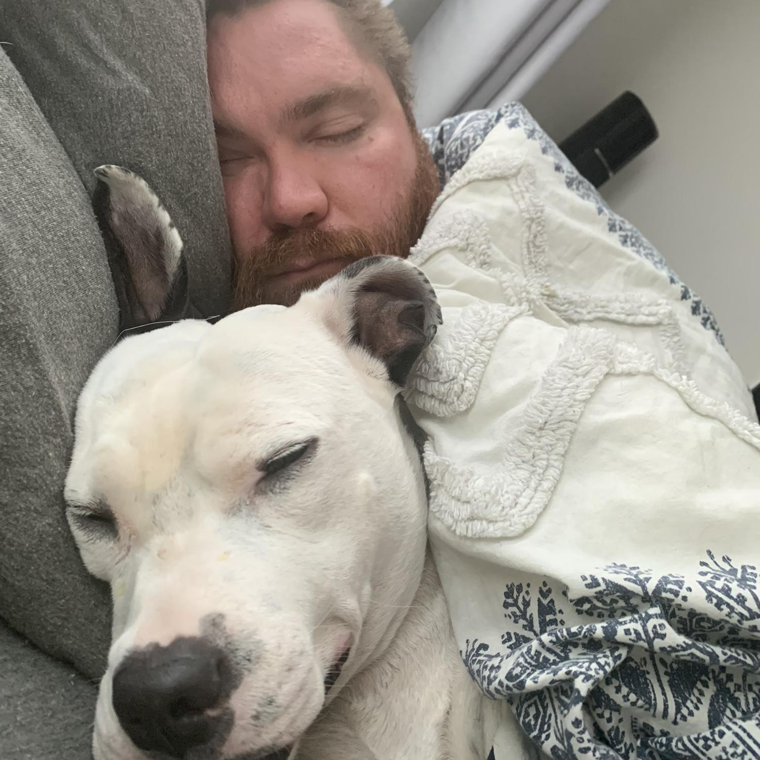 Banks taking a nap with favorite daddy