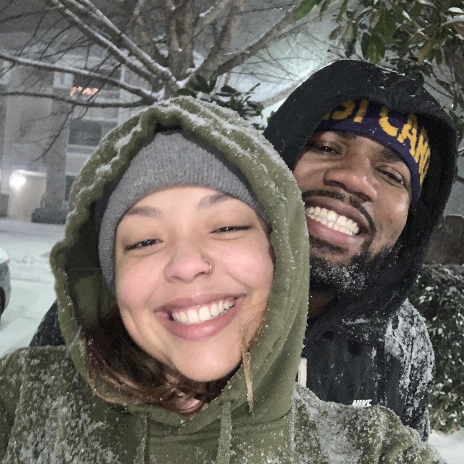 Us enjoying the snow when we were in college junior year. It was freezing but James was in heaven!