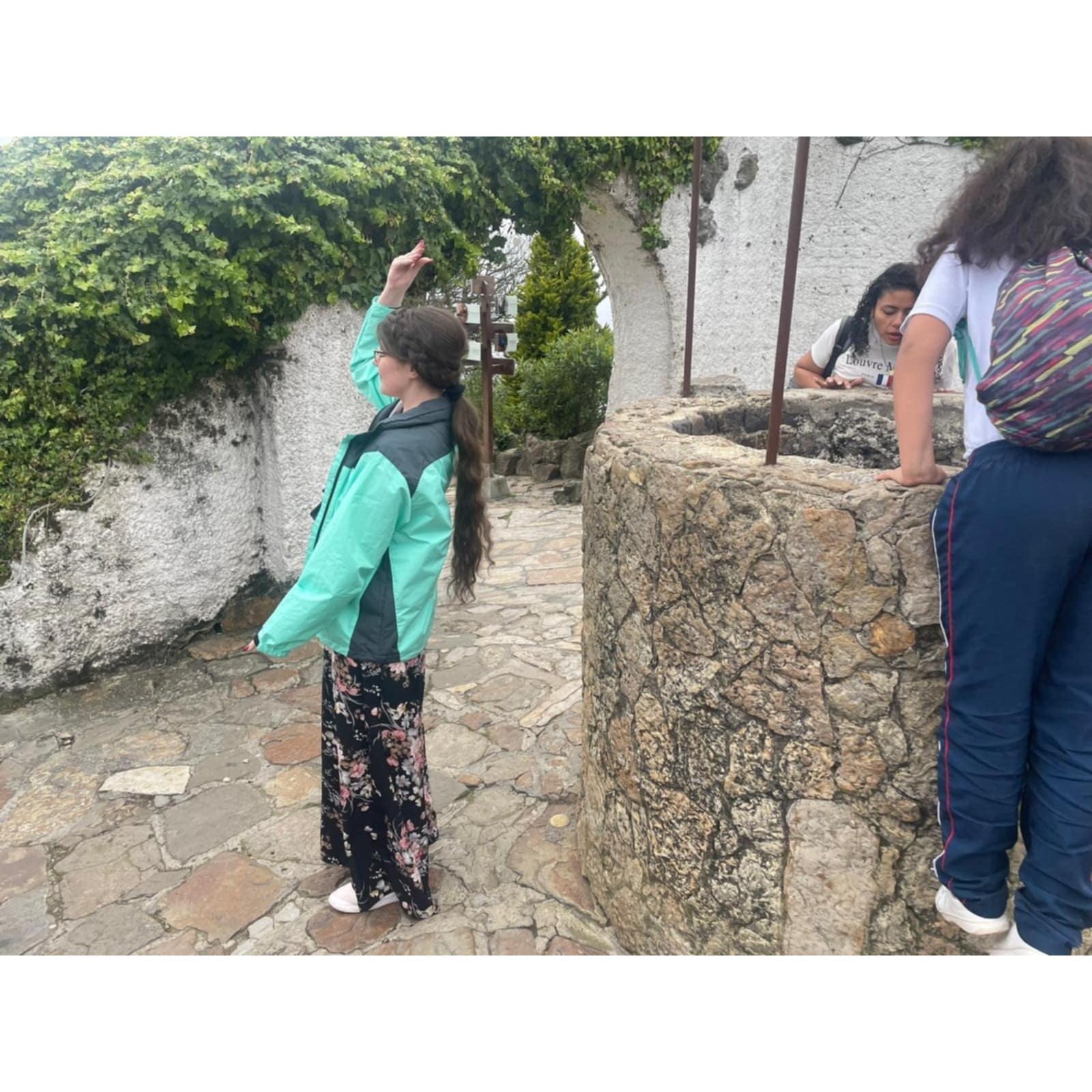 Samantha "wishing he'd propose before the trip ends" at Monserrate's Wishing Well || Location: Bogota, Colombia