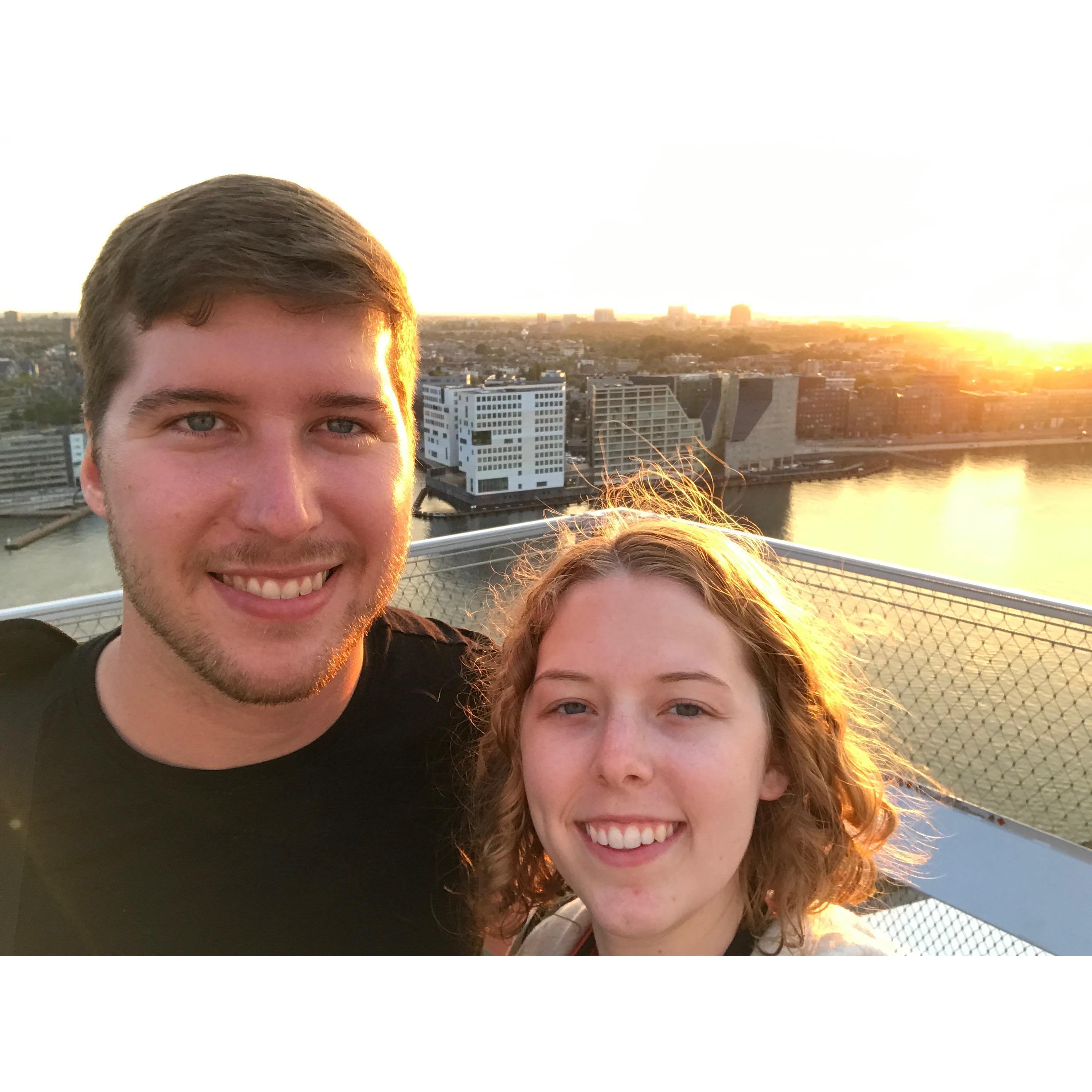 A beautiful sunset on the rooftop overlooking Amsterdam.
