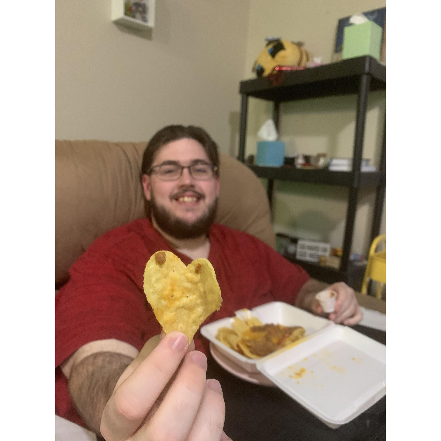 Manny presents Clydos with a heart shaped chip during their Valentine’s Day date.