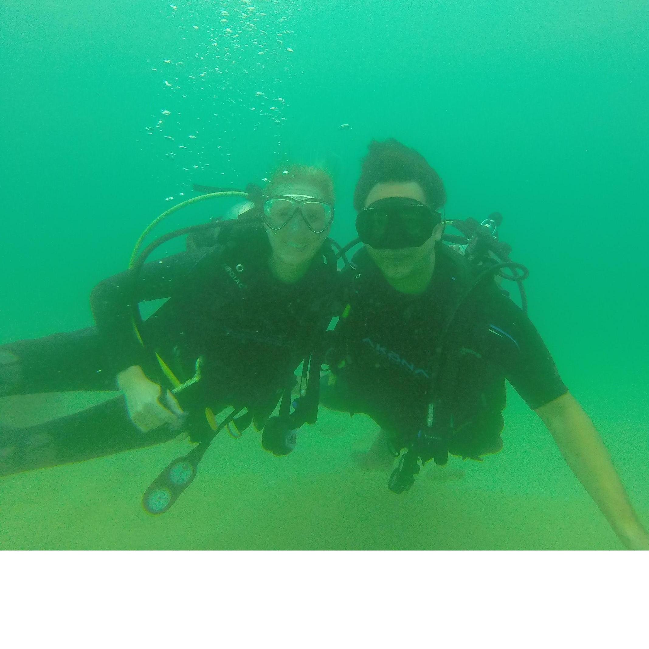 Chetin's 1st dive in terrible visibility in Los Cabos, August 2018. Despite the poor conditions, Chetin loved it, and we're diving in Raja Ampat, Indonesia on our honeymoon!