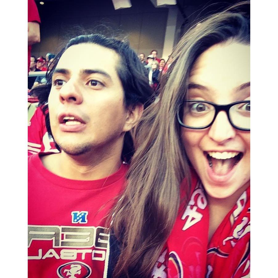 Our trip to watch the Niners play! As you can see, we were both fully immersed in the game...