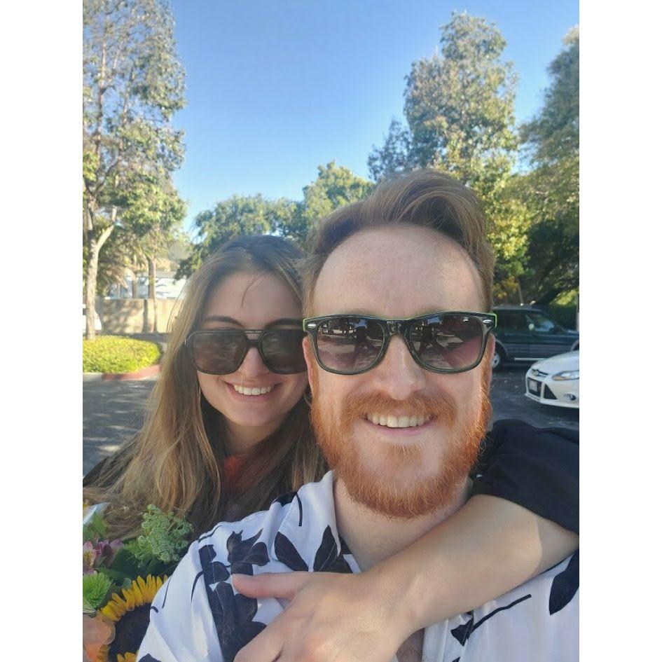 Brayden supporting Sarah after she graduated with her Masters in Engineering