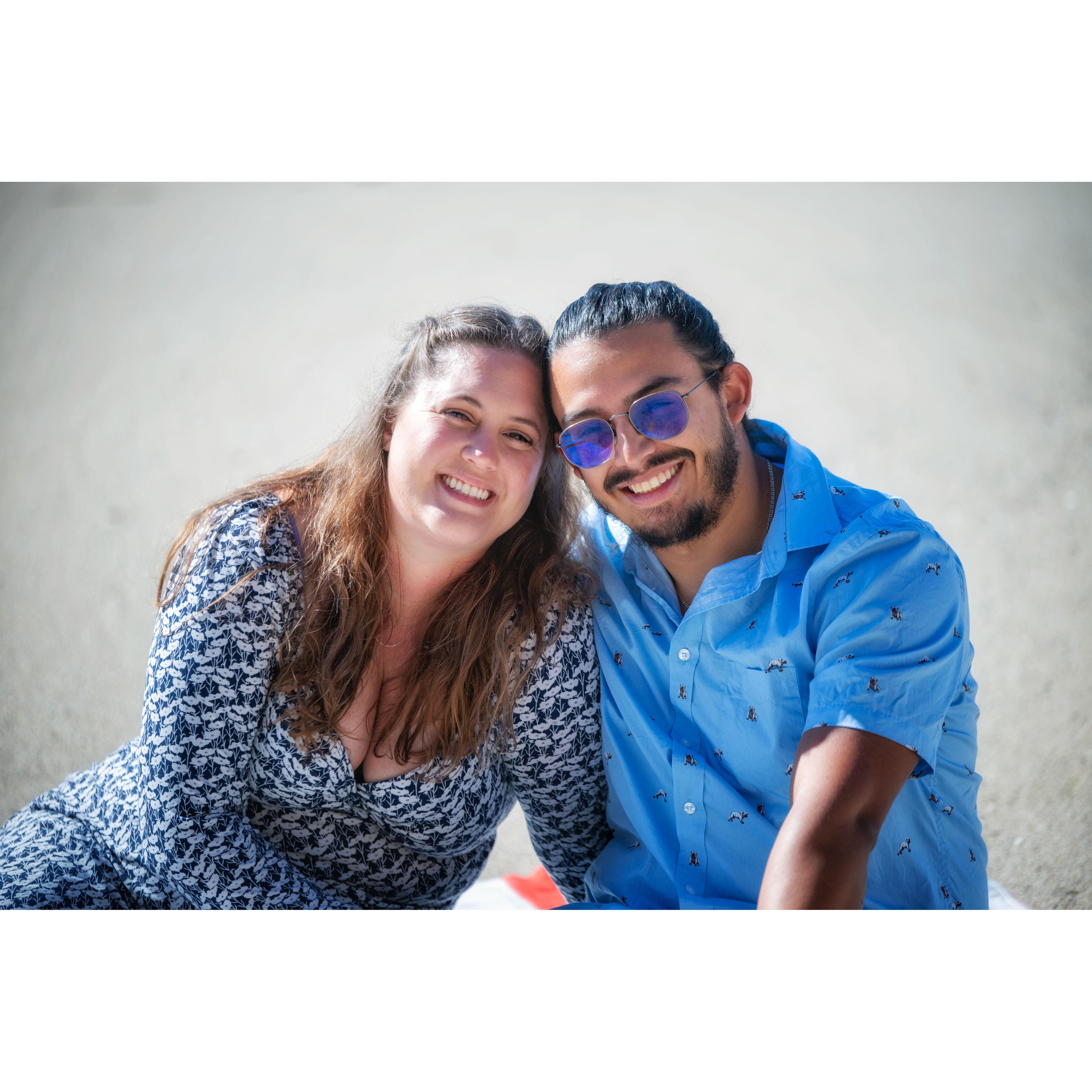 Our engagement shoot photo with Charles, who took our first picture together.