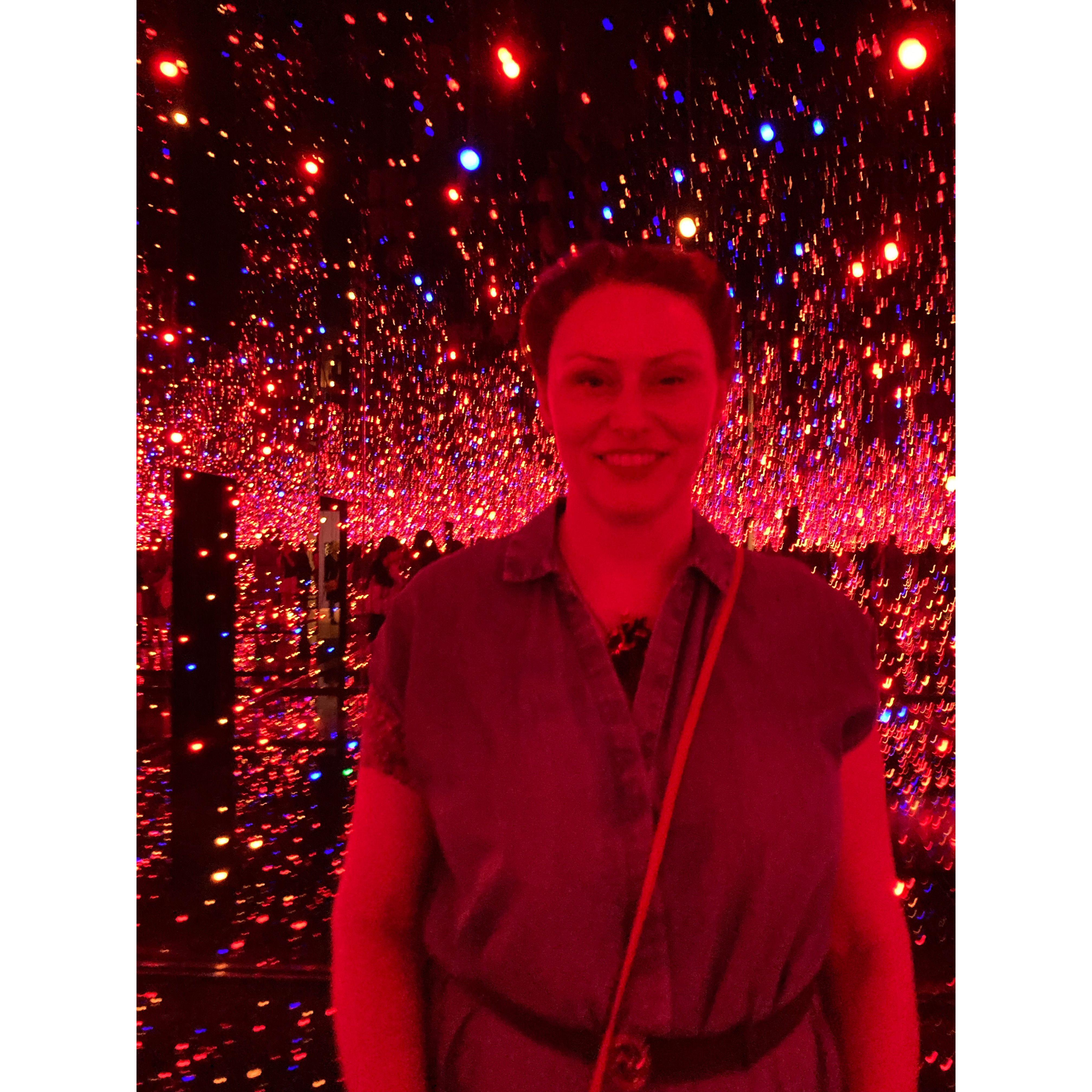 At Tate Modern in Yayoi Kusama's mirror rooms.