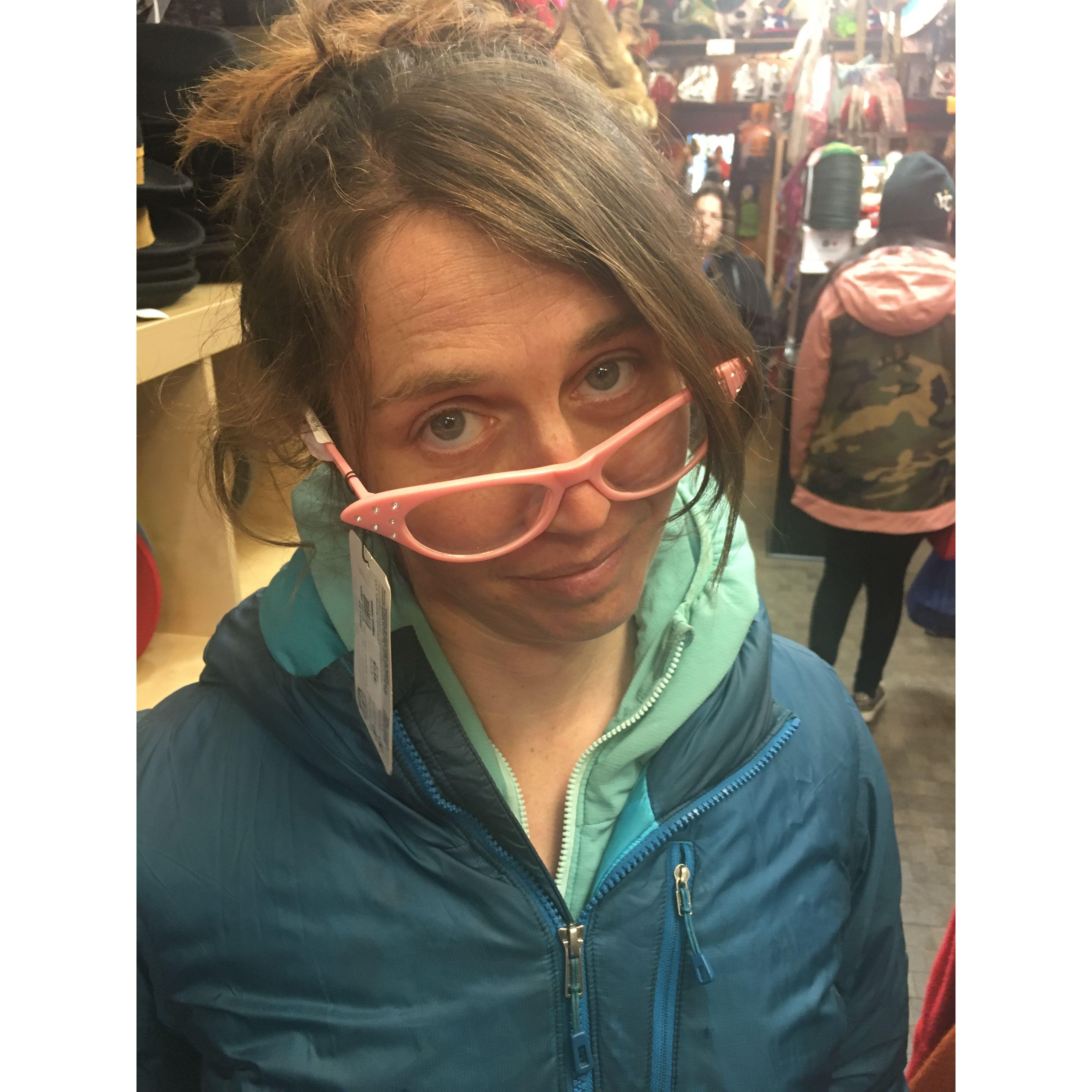 Trying on some new glasses.