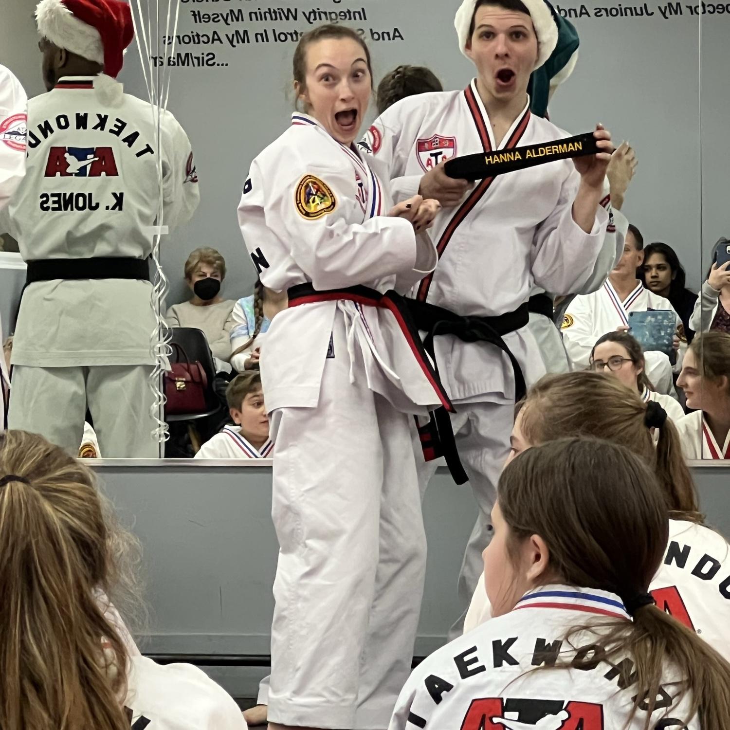 Dante got to present Hanna with her 1° black belt - December 2022
