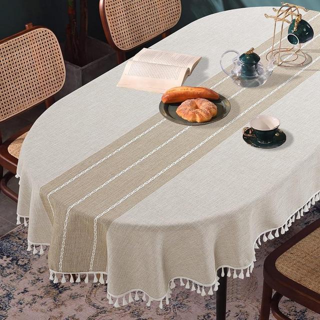 HOMBYS Solid Embroidery Oval Tablecloth with Tassels for Oval Table, 60 x 102 Inch Lace Dust-Proof Table Cover for Kitchen Dinning, Wrinkle Free Anti-Fading Tabletop Decoration