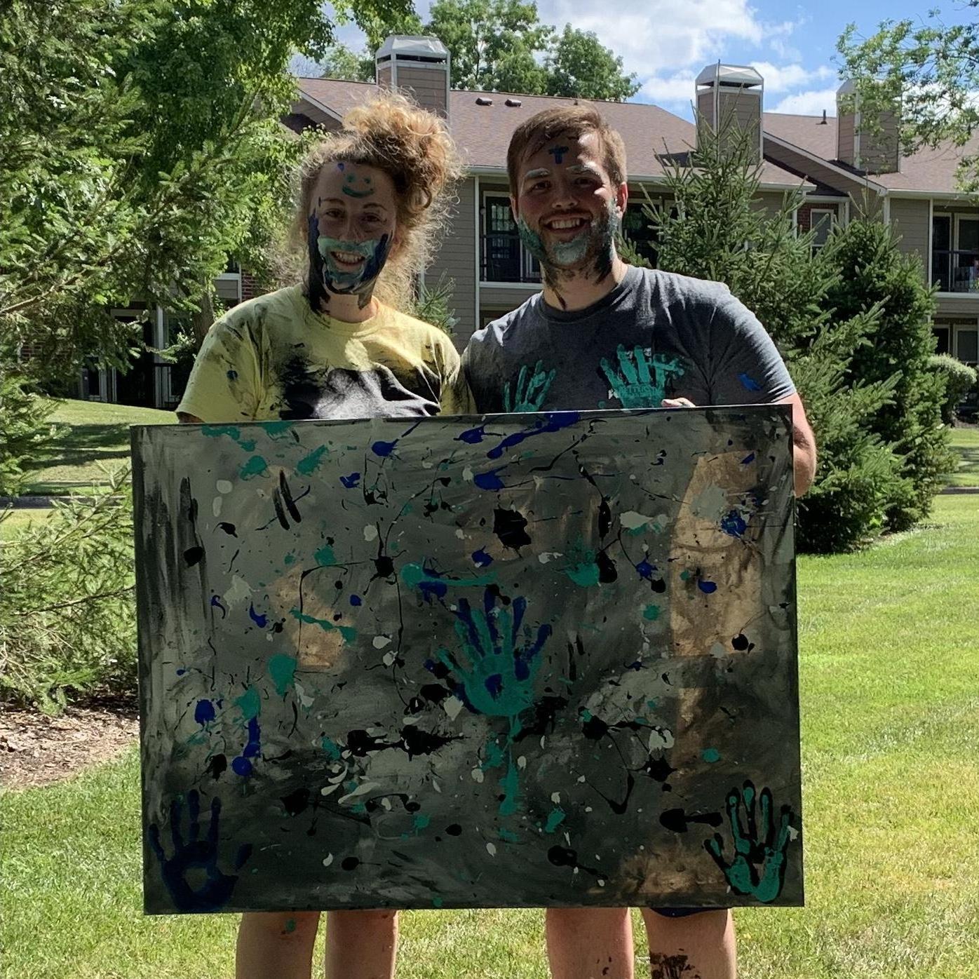 We tried something different last summer and had a paint fight. That's hanging up in his living room!