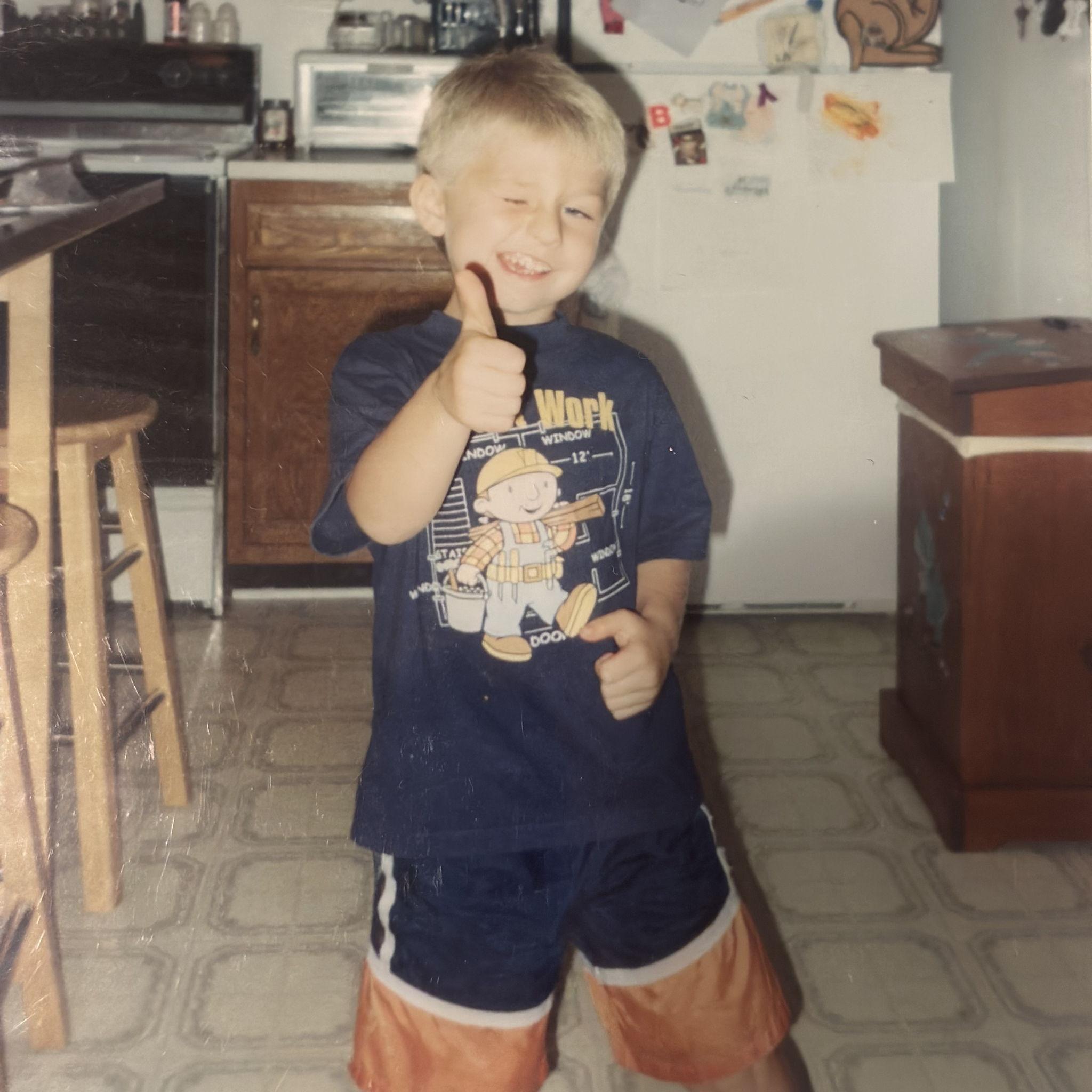 thumbs up from little Corey for a job well done on the proposal! - Corey