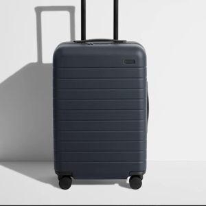 The Bigger Carry-On in Navy Blue