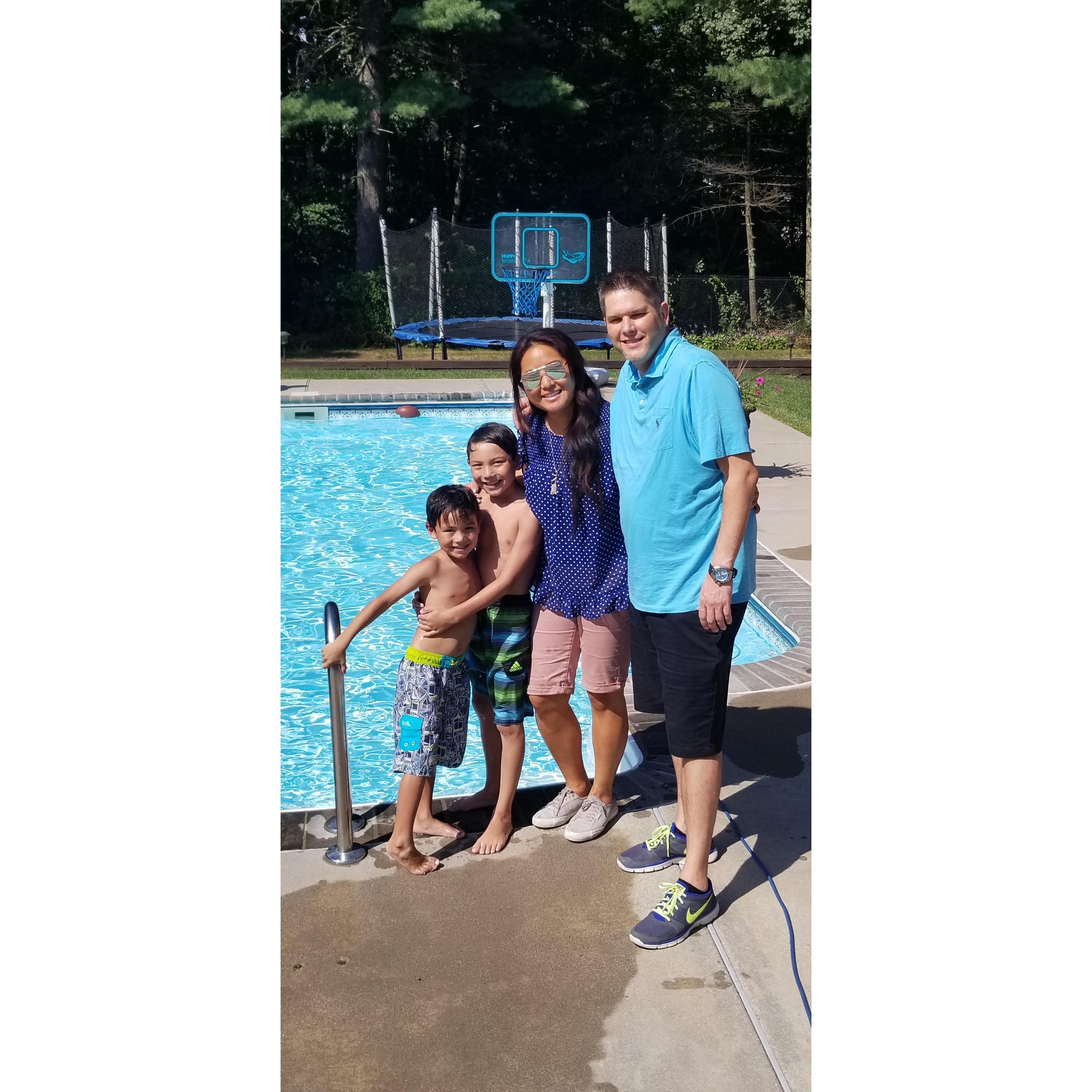 Visiting Boston (Trent's First Trip) and First Meeting with Angela's Sister's Family: pictured here with nephews Greyson and Everett in their backyard pool.