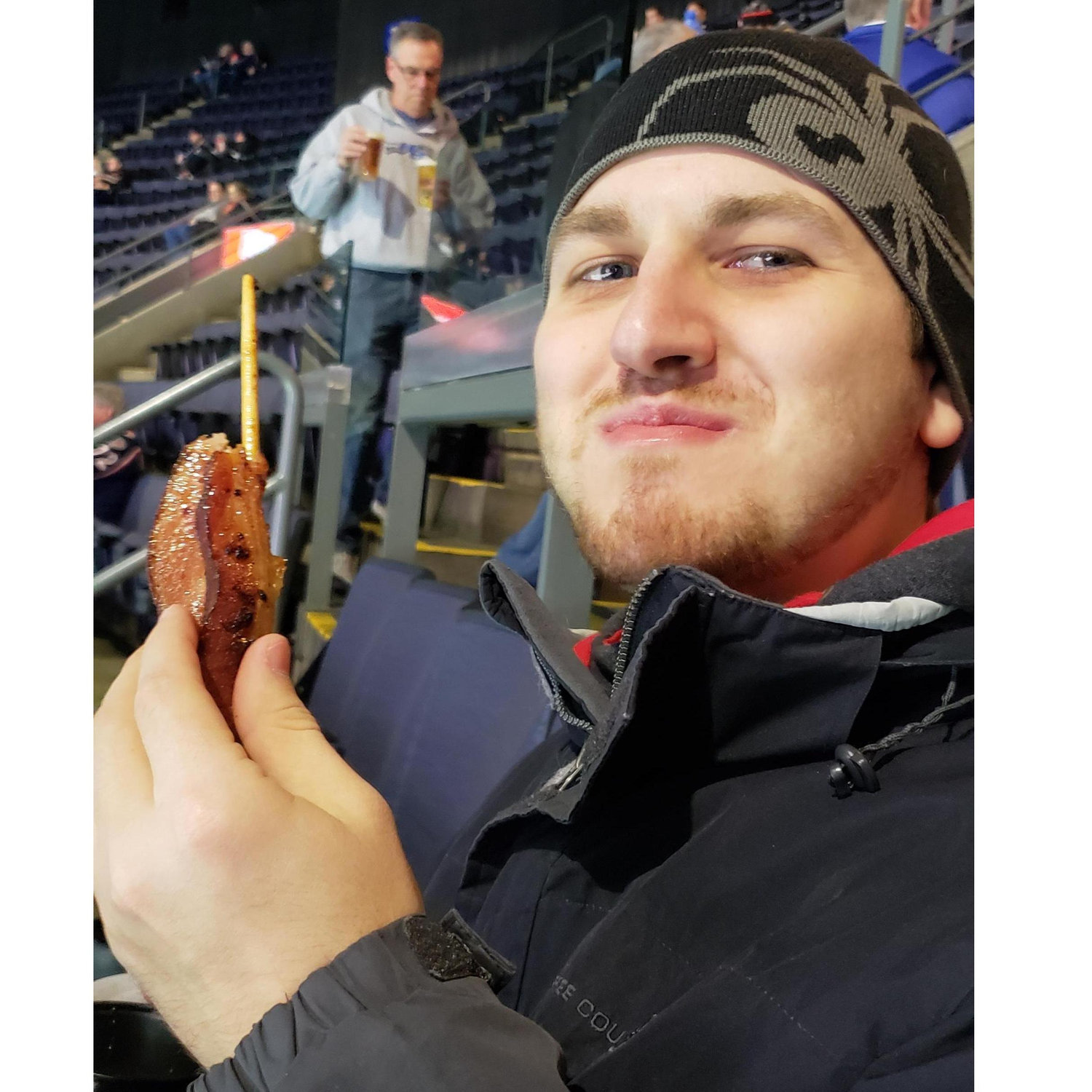 First hockey game together! With bacon on a stick. #CBJ 1.15.19