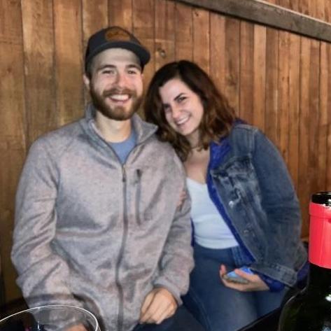 At a favorite neighborhood spot doing our favorite thing - sharing a bottle of wine with our friends.