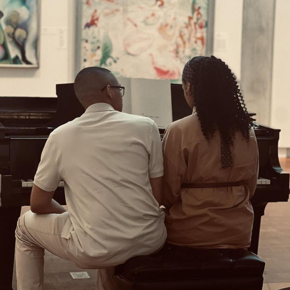 Abdul’s first attempt at teaching Safiyyah piano