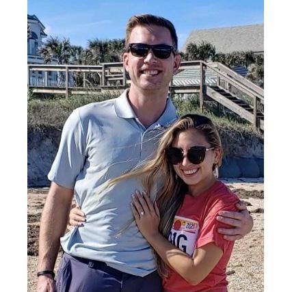 Never seen before... first picture taken after Drew proposed (taken by a random couple walking on the beach).